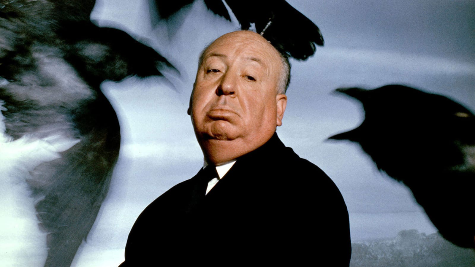 Promotional image for Alfred Hitchcock: Ultimate Collection (4K Blu-ray) featuring iconic film posters, vintage design, and suspenseful theme.