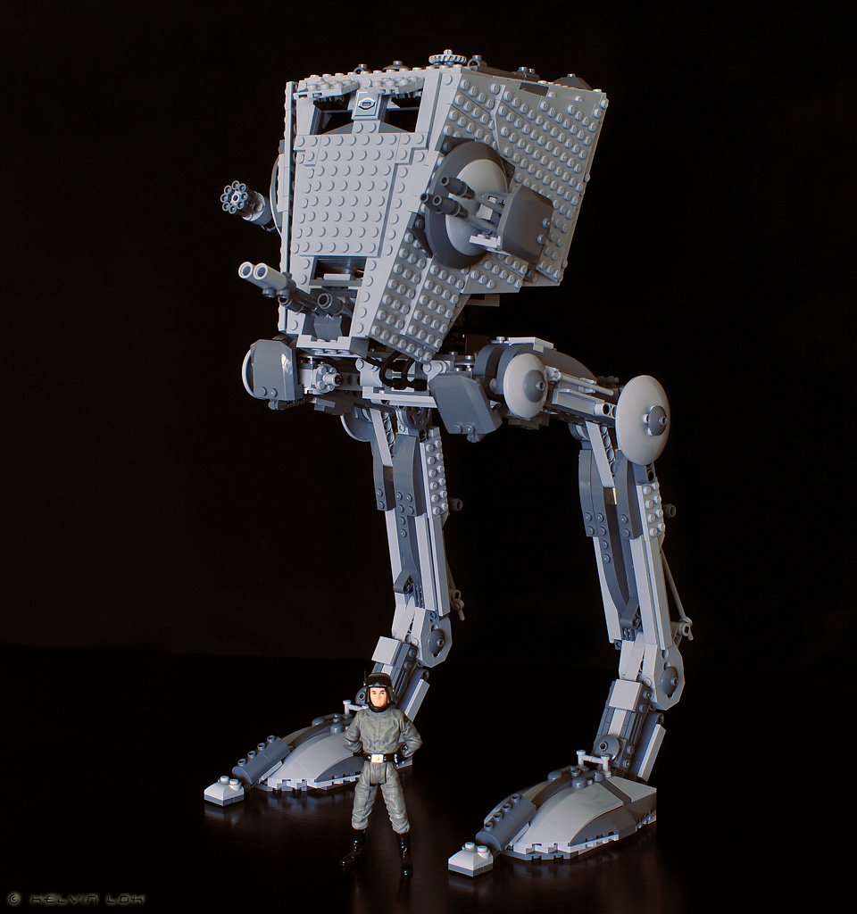 LEGO Star Wars AT-ST UCS set displayed in a sci-fi environment with detailed features and an AT-ST driver minifigure.