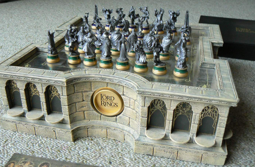 Detailed visual of a Lord of the Rings themed chess set featuring Gandalf, Sauron, and other iconic characters.