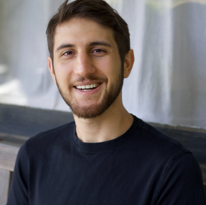 Digital portrait of Kevin Afghani as the new voice of Mario in a colorful and whimsical Mario-themed landscape.