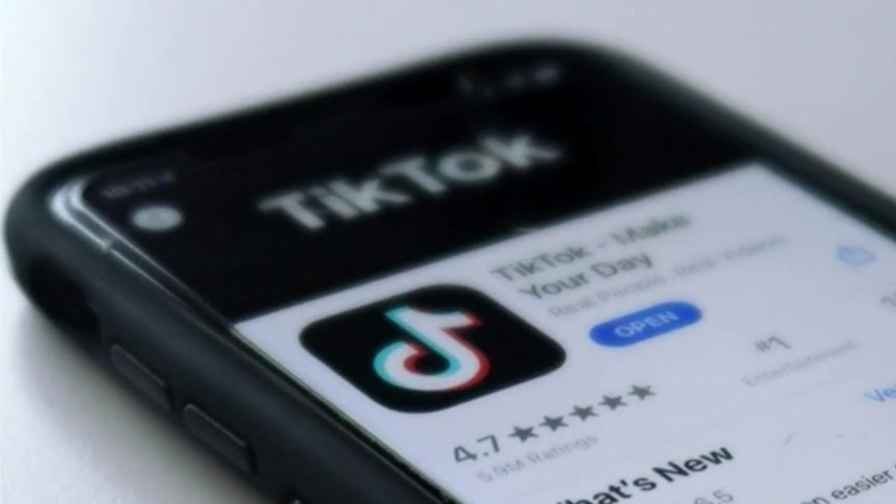 Conceptual illustration showing TikTok logo censored with the word Epstein crossed out, representing social media controversies and freedom of speech issues.