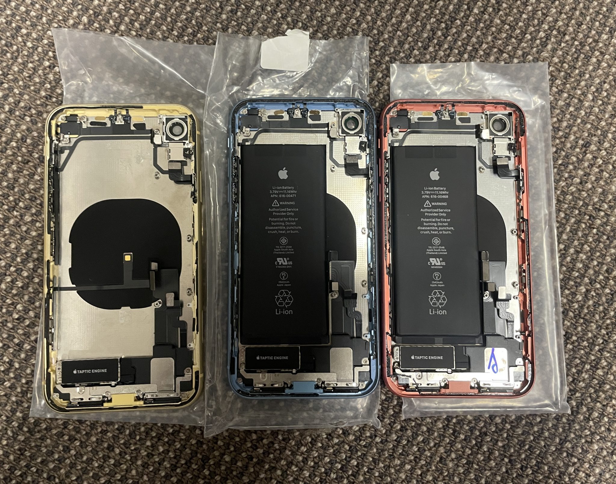 An illustration of a worried user holding a turned-off iPhone in a dimly lit room, symbolizing common iPhone issues and the importance of technical diagnostics.